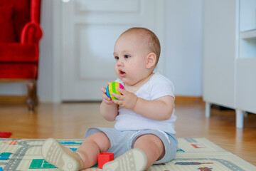 Baby boy playing with toy