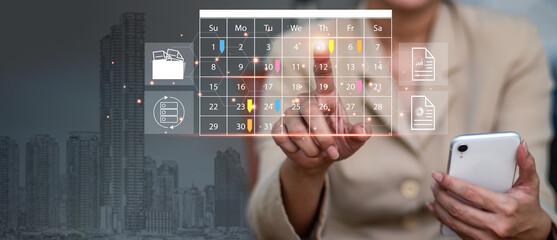 Reminder Appointment for the Calendar and the Organizer's Agenda Timetables and agendas used by event planners to organize and schedule activities. The woman on a phone, making notes on calendar app. - Powered by Adobe