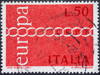 ITALY - CIRCA 1971: a postage stamp from ITALY, showing a chain with chain links as a symbol of...
