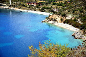 Fototapeta na wymiar Crystal clear waters with sandy beaches and secluded bays.Along the Ionian coast is the most beautiful sea where the rugged coast offers magnificent bays with sandy or pebble beaches with a blue-green