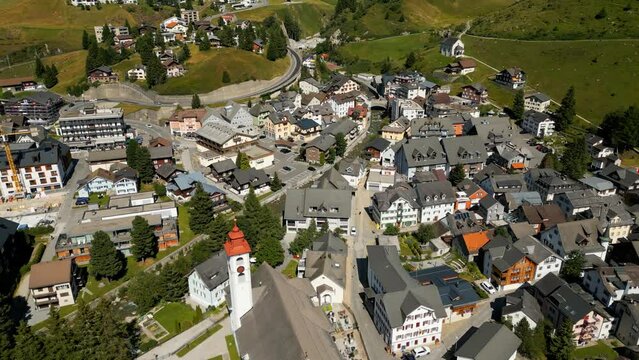 Flight over the village of Andermatt in Switzerland - aerial view