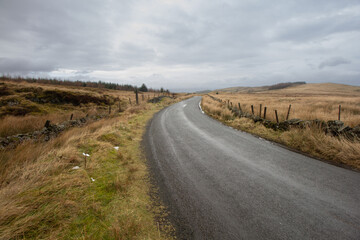 Fototapeta na wymiar A Country road int he Scottish Highlands 