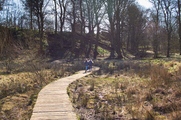Two young girls on a nature walk in the country