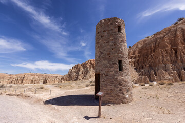 Civilian Conservation Corps Water Tower and Rock Formation in the desert of American Nature Landscape. Cathedral Gorge State Park, Panaca, Nevada, United States of America. Background