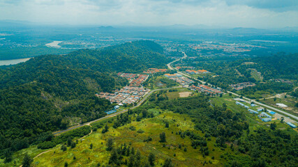 Fototapeta premium Aerial drone view of small town area in Pantai Marina Telaga Simpul, Kemaman, Terengganu, Malaysia.