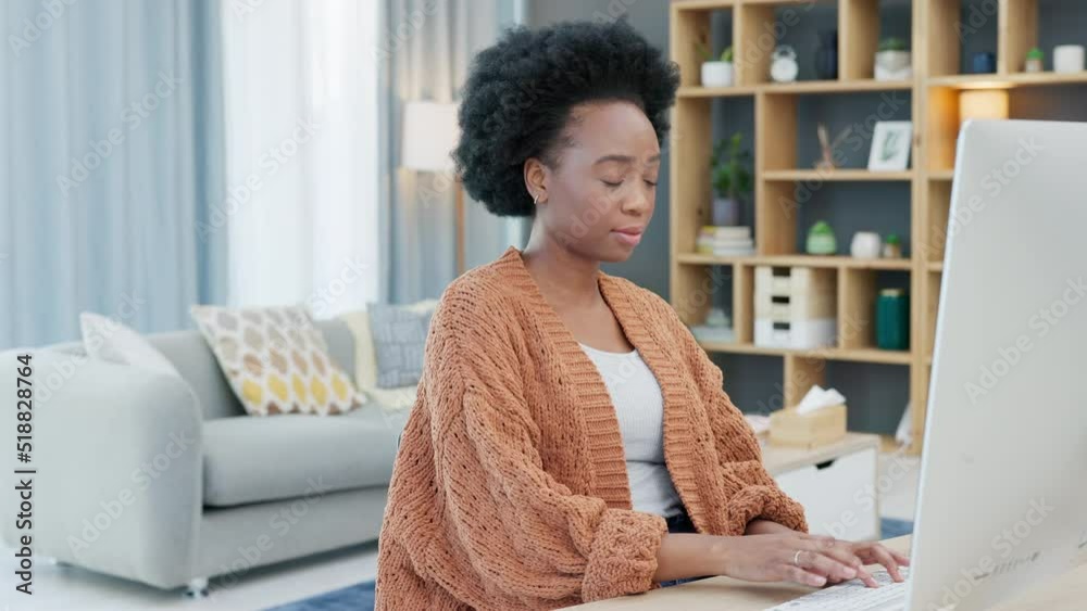 Aufkleber Young woman working remotely on a computer from home. Dedicated student browsing the internet while doing research and planning for an online course. Confident freelance entrepreneur typing a blog