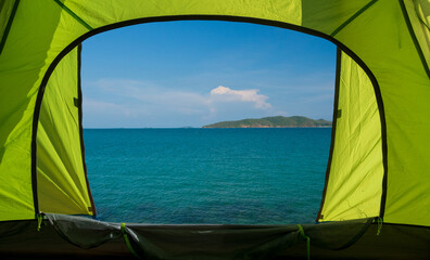 Traveler green tent Being located on the beach look the Blue sea and sky calm landscape viewpoint...