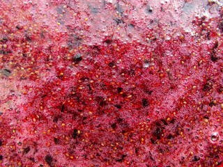 Black currant jam. Dark Red Berry Jam Flat Background. wild berries jam. Red abstract background.