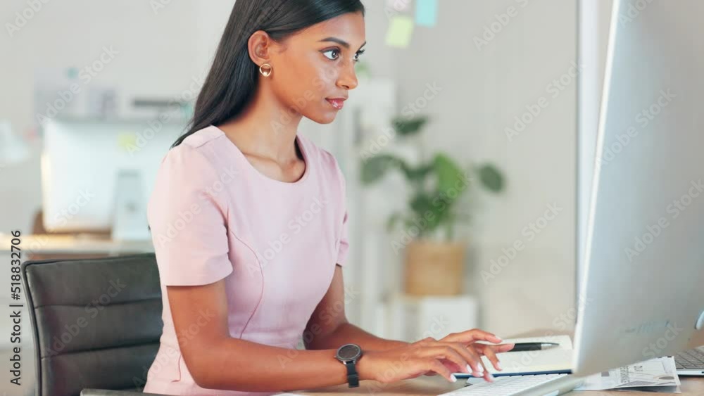 Aufkleber personal assistant typing a speech for her boss on a computer in an office. a young female secretary