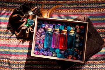 Dice tray filled with dice and potion bottles