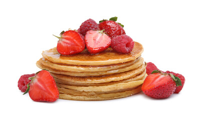 Tasty pancakes with fresh berries and honey on white background