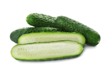 Whole and cut cucumbers on white background