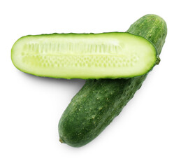 Whole and cut cucumbers on white background, top view