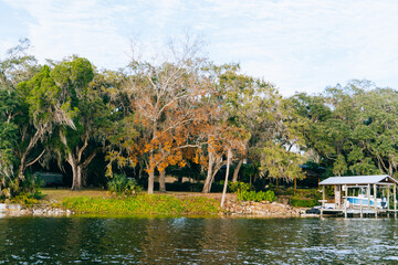 Obraz premium Riverview, Florida, USA - 02 10 2022: River view house and dock along Little Manatee River 