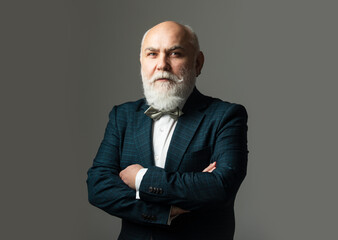 Senior Man. Confident businessman posing with folded arms.