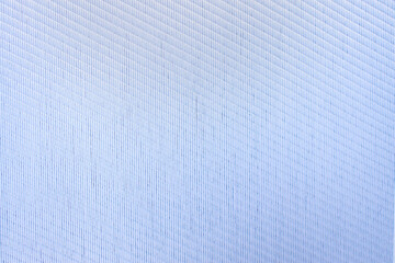 Fabric textured blue background. Fabric background of dense sun protection fabric used for the manufacture of fabric blinds