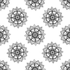 a pattern in the form of a round mandala. Ethnic Seamless Floral Contour Pattern Round Stylized Mandala flowers with Isolated, Black Line on White for Pattern Design, textiles, Tiles, background