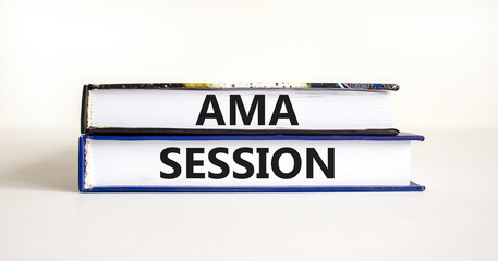 AMA ask me anything session symbol. Concept words AMA ask me anything session on books on a beautiful white table white background. Business and AMA ask me anything session concept. Copy space.