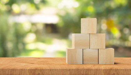 3d Wooden cubes on a wooden surface. 3d information background. 3d rendering