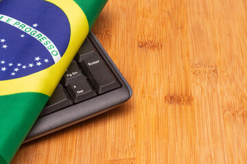 LAURO DE FREITAS, BRASIL - JULY 21, 2022 : brazilian flag with a keyboard