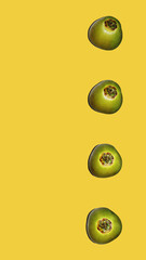 background, a row of green coconuts on a yellow background