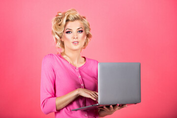 Beauty woman using laptop computer isolated background. Sexy secretary.