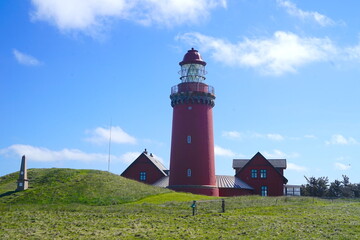 famous Bovbjerg Fyr, lighthouse on the North Sea coast of Denmark, danish landmark, travel, tourism, attraction  - obrazy, fototapety, plakaty