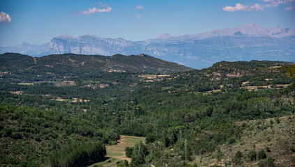 view over a natural park to a mountain range