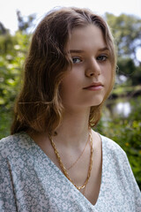 Beautiful girl relaxing on picnic in the park