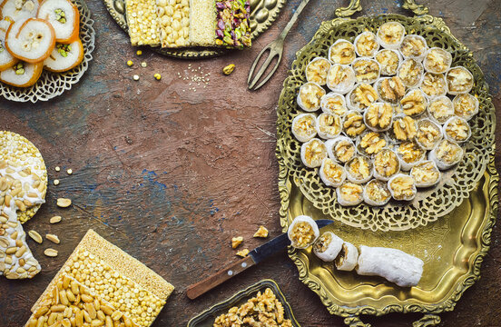 Varieties of traditional candies and sweets to celebrate "Prophet Muhammad's Birthday event". Top view with copy space.