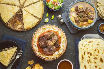 Arabic cuisine; Middle Eastern traditional lunch. It's also a meat-based meal to celebrate "Eid-Al Adha" or "The Festival of the Sacrifice". Assorted of Egyptian oriental dishes. 