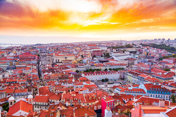 Beautiful panorama of old town and Baixa district in Lisbon city during sunset, seen from Sao Jorge Castle hill, Portugal