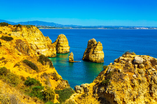 Beautiful sandy ciffs along Algarve ocean coast neer Lagos city, Portugal