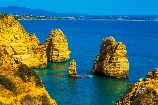 Beautiful sandy ciffs along Algarve ocean coast neer Lagos city, Portugal