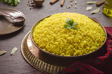 Arabic cuisine; Traditional plain Basmati rice. Topped with fresh parsley. Close up with copy space