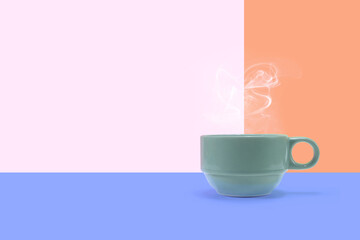 coffee cup on pink,orange and violet background.