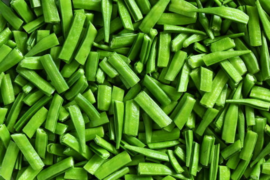 fresh chopped or cut indian vegetable green cluster beans or guar beans ready for cooking,can use as food,health related concept background
