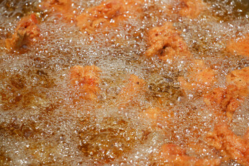  Fried chicken in deep fry outdoor 