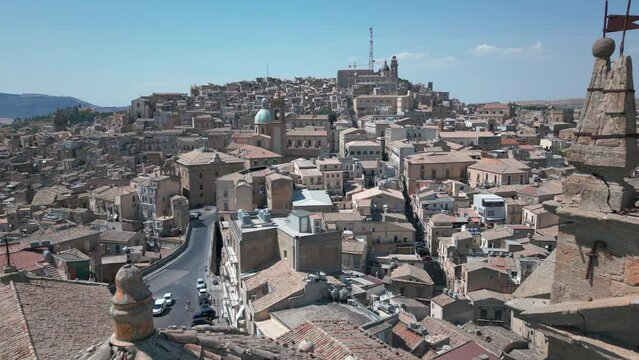 view of historic Caltagirone Sicily flying backward over old church