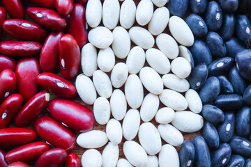 Various beans including red kidney beans, black beans and white haricot beans 