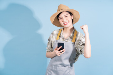 Portrait of young Asian female farmer