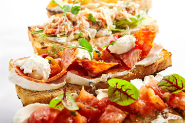 Bruschettas with seafood and vegetables