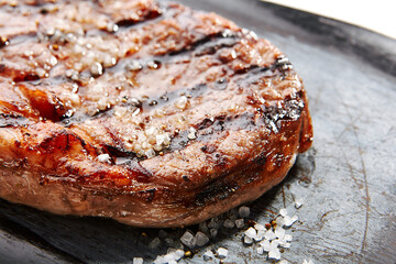 Ribeye steak with salt and spices