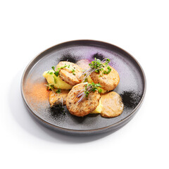 Fishcakes with garden cress side view
