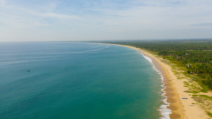 Fototapeta na wymiar Aerial drone of Sandy beach and turquoise water. Kalkudah Beach, Sri Lanka.