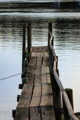 Fototapeta premium Old wooden wharf on the inlet, Merimbulla, NSW, June 2022