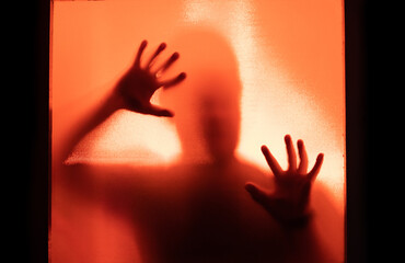 Shadowy figure, man behind glass - horror background