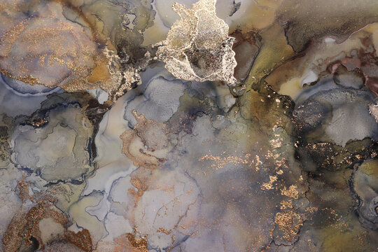 art photography of abstract fluid art painting with alcohol ink, black and gold colors © tomertu
