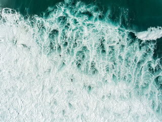 Aerial view of surfers at Atlantic Ocean, Portugal