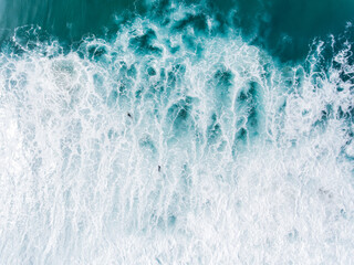 Aerial view of surfers at Atlantic Ocean, Portugal